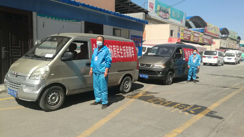 圖為：副食市場居民生活保障供應車輛_副本.jpg